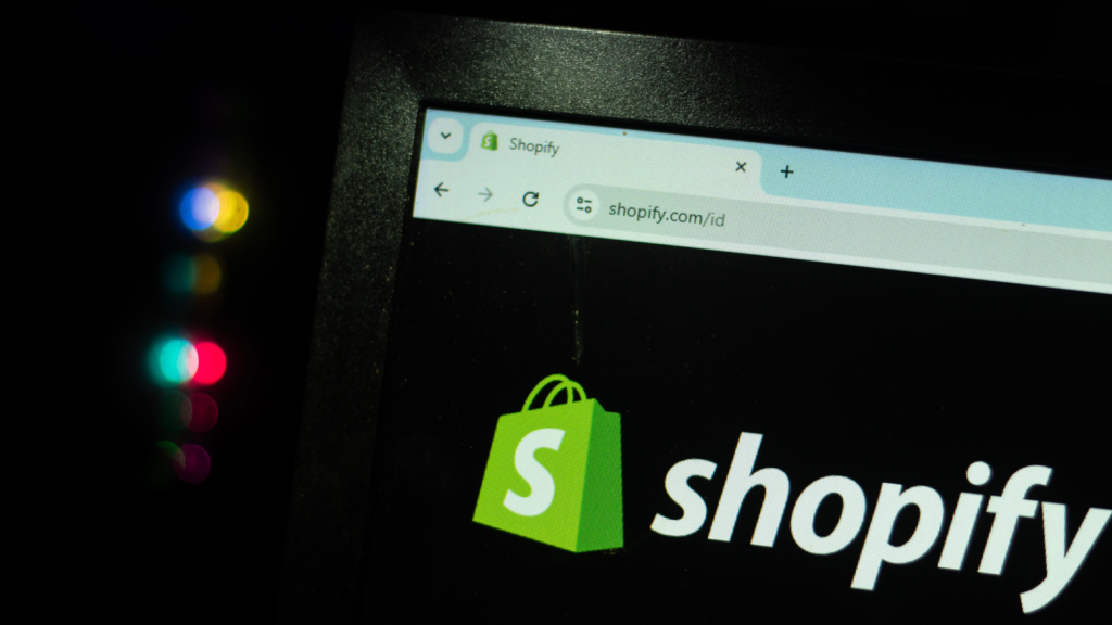 A closeup shot of Shopify’s homepage on a laptop screen.