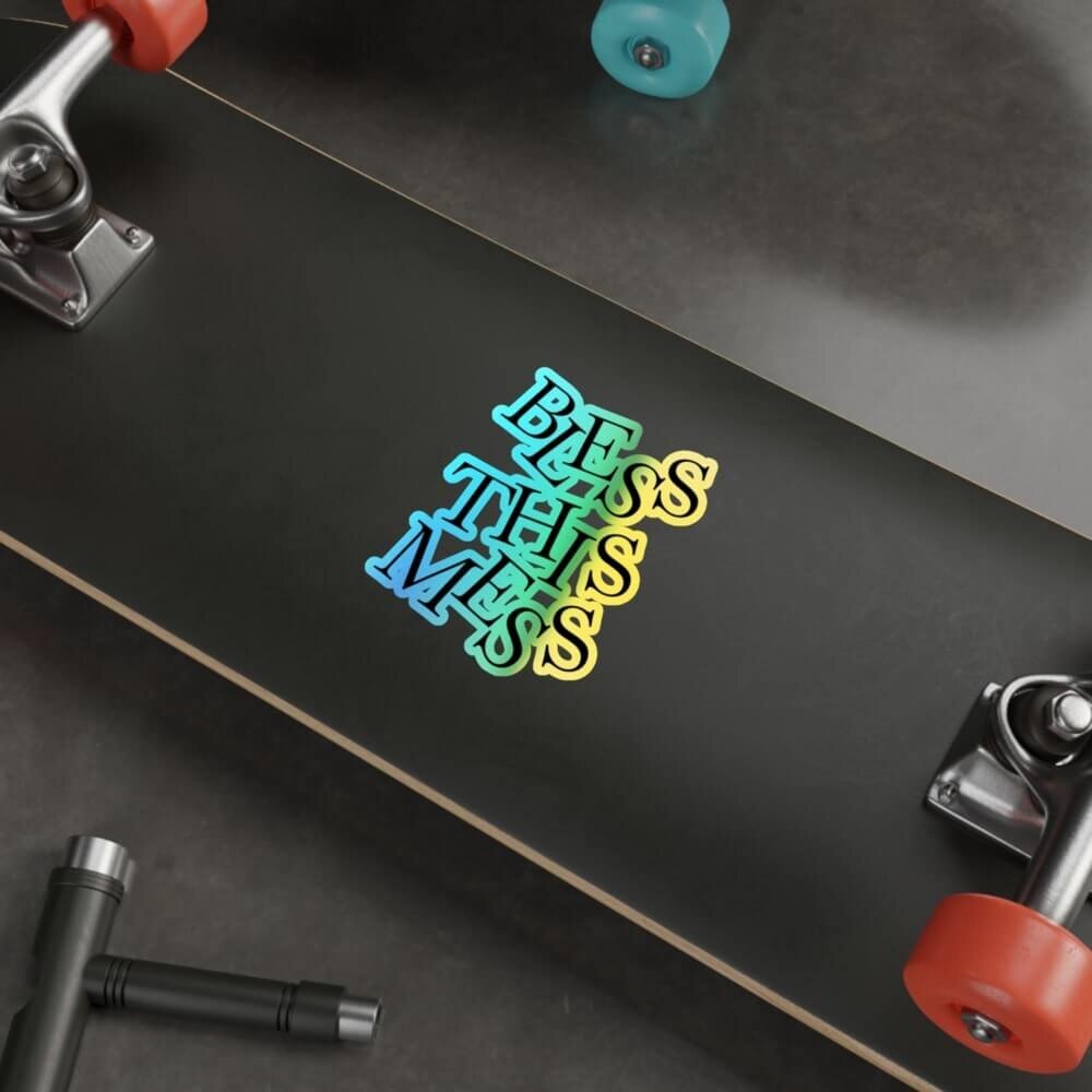 A skateboard with holographic die-cut sticker on it.