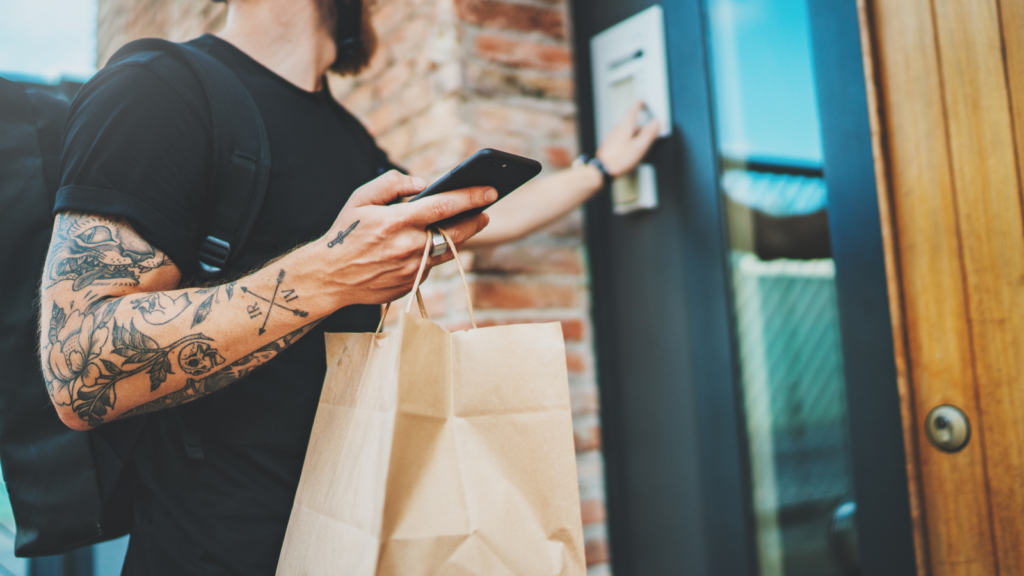 A food delivery person delivered food to people.