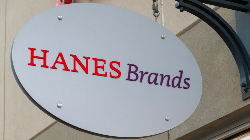 A sign with the Hanes Brands logo on it.