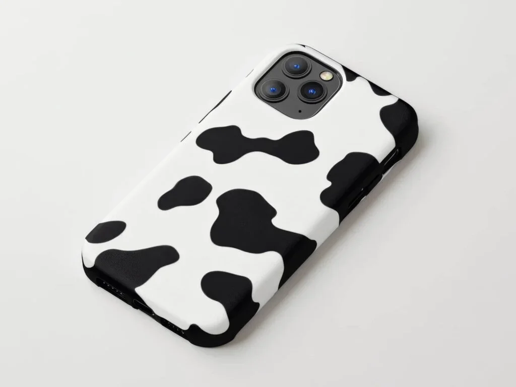 A phone with an animal-print phone case.