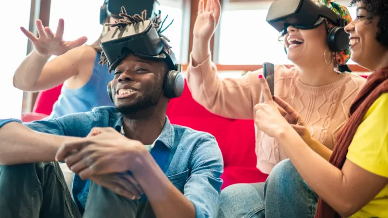 A group of people playing video games together and having fun.