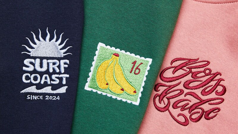 Three pieces of fabric featuring different embroidery: "SURF COAST SINCE 2024", bananas, and "Boys Babe" in a stylized font.