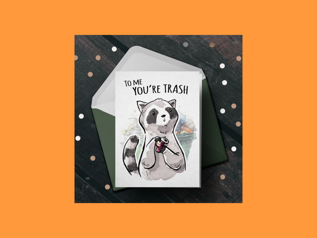 A greeting card with a raccoon illustration on it.