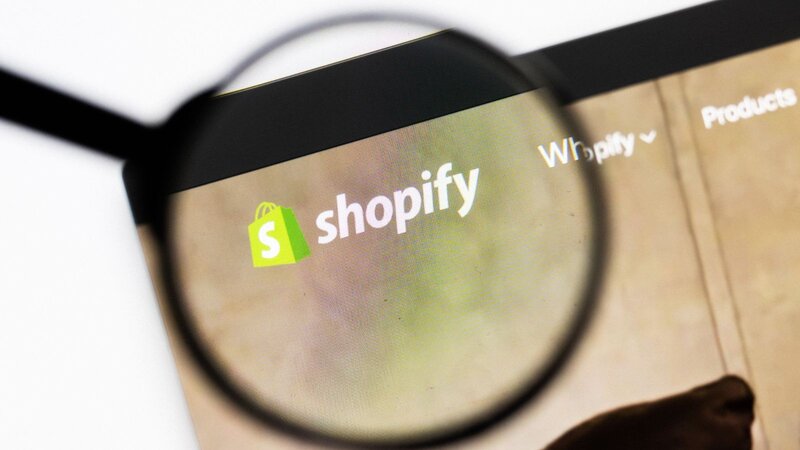 Shopify website on the laptop screen.