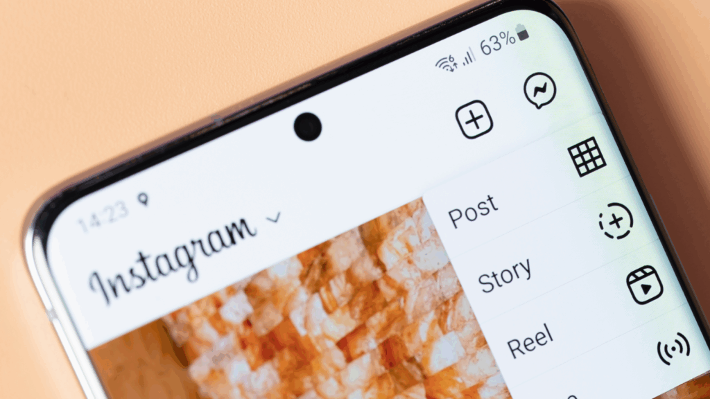 A close-up shot of a mobile phone with the Instagram app open.