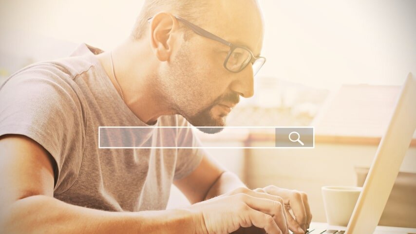 A man doing keyword research for Etsy.