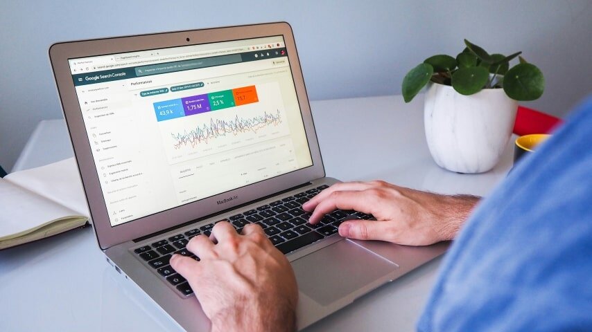 A person typing on a computer.