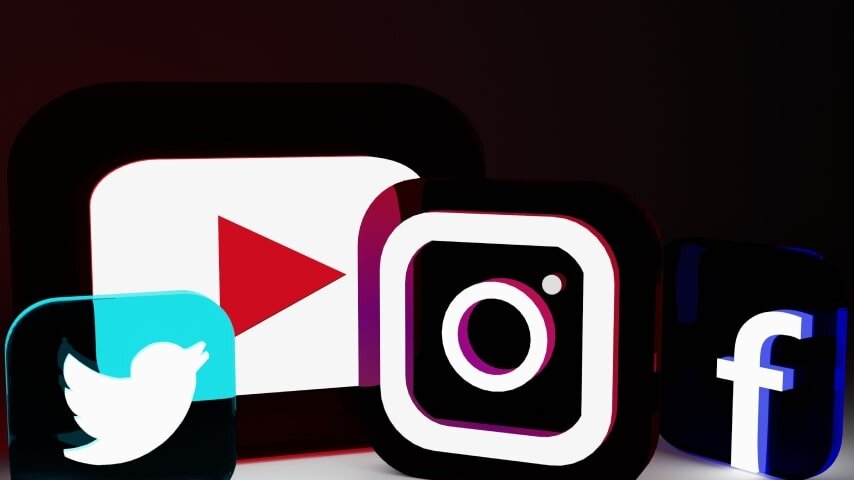 A set of social media icons – Twitter, Instagram, Facebook, and YouTube.