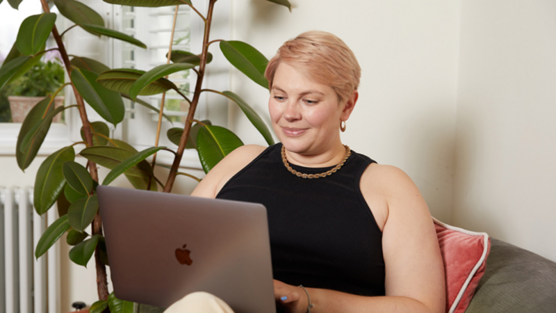 A woman working on a computer.