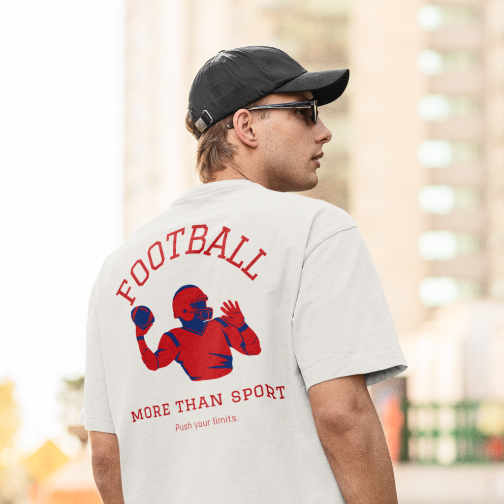 Man wearing a white t-shirt with a red-blue football player graphic and phrases "Football", "More than sport", and "Push your limits".
