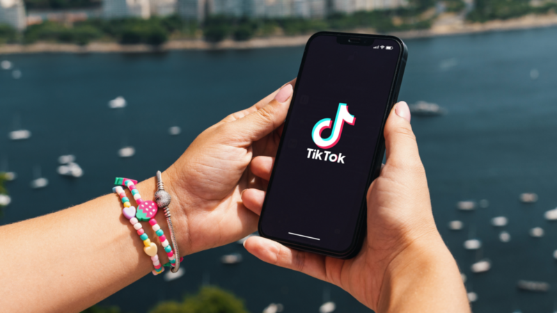 A person is opening the TikTok app.