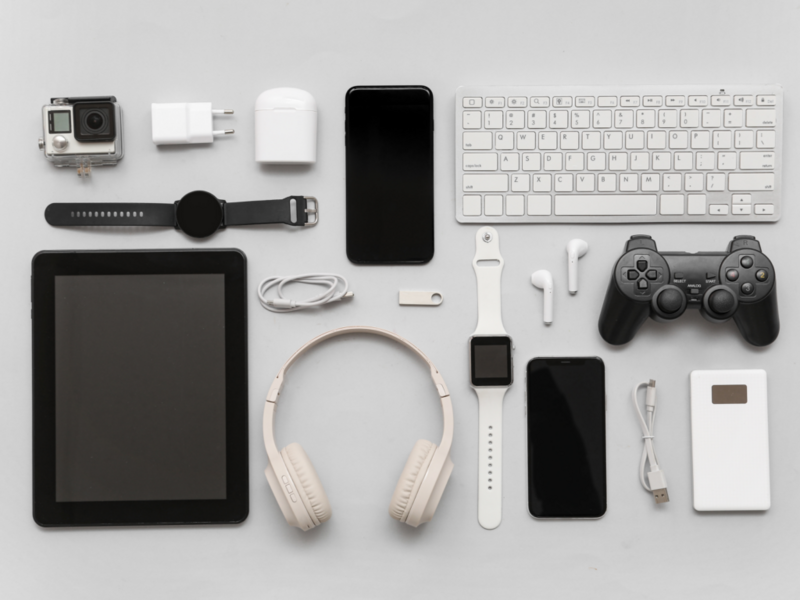 Display of popular electronic items: tablet, headphones, mouse, keyboard, and accessories, all best-sellers on Etsy.