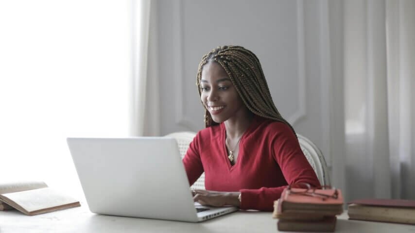 A woman managing her Etsy orders.