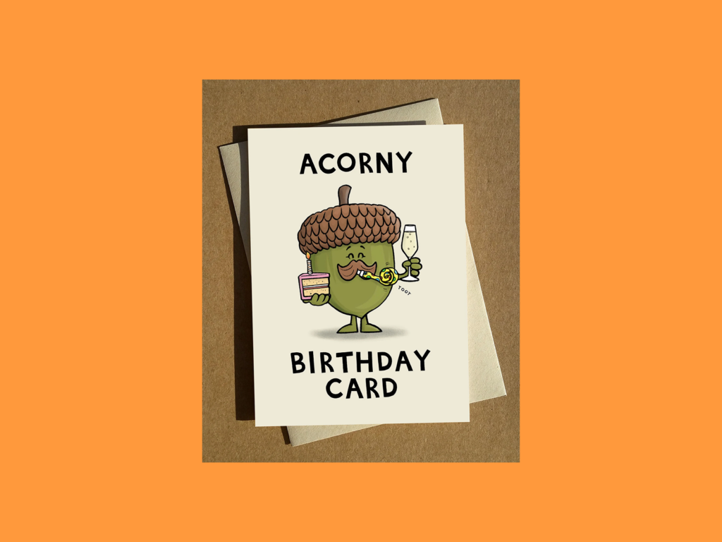 A greeting card with an acorn on it.