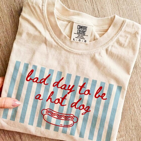 Dark-blue “Happy Fourth of July” t-shirt.