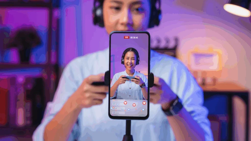  young woman is livestreaming using a mobile phone.