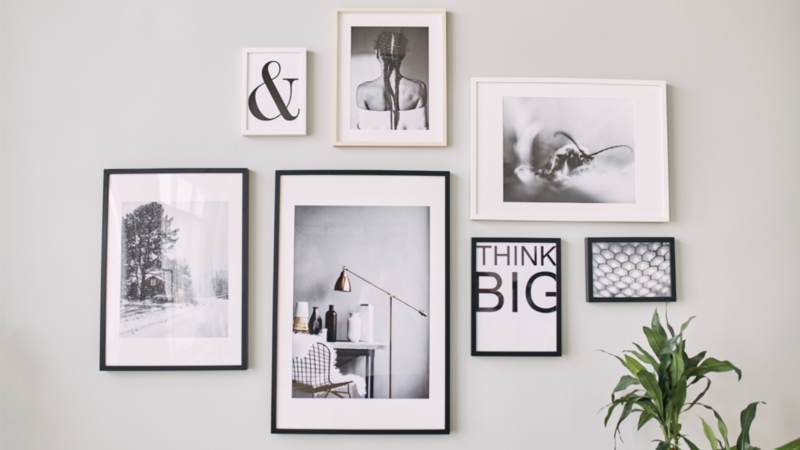 A set of paintings on the wall