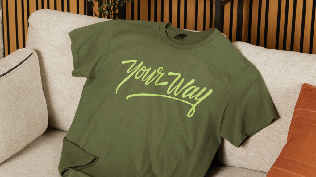 A custom dark-green “Your way” t-shirt.