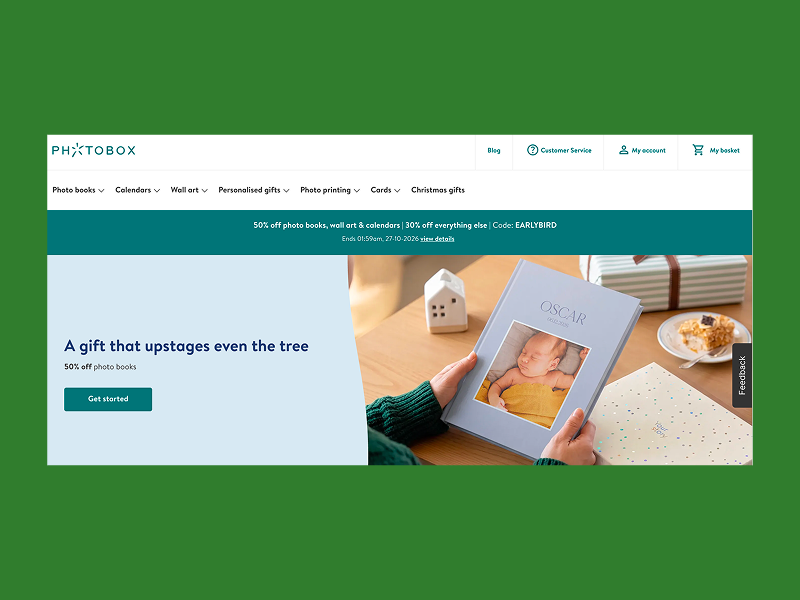 Photobox homepage showing a personalized baby photo book.