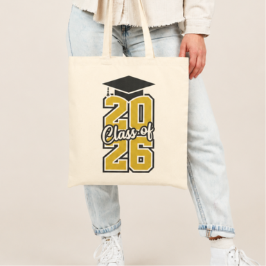 Person carrying a Class of 2026 graduation tote bag