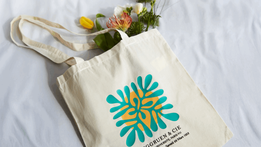 A tote bag on a white background with a custom print.