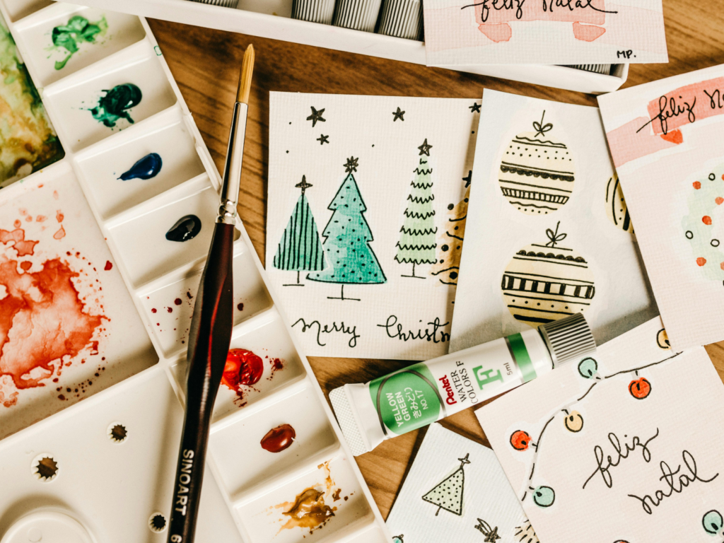 A bunch of hand-painted Christmas cards.