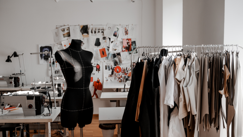 A mannequin resting on a stand in a room, emphasizing its design against a neutral background.
