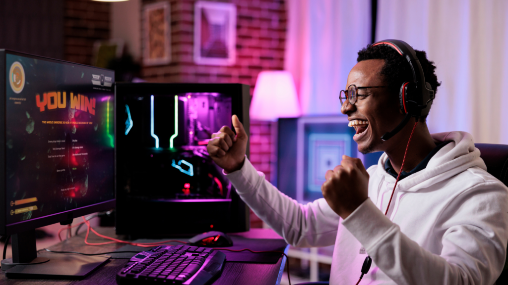 An online streamer celebrating victory by winning a game.