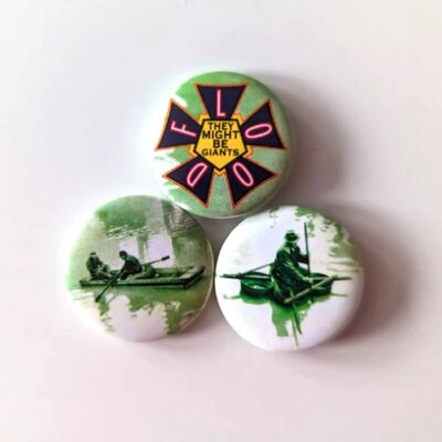 They Might Be Giants' “Flood” merch pins.
