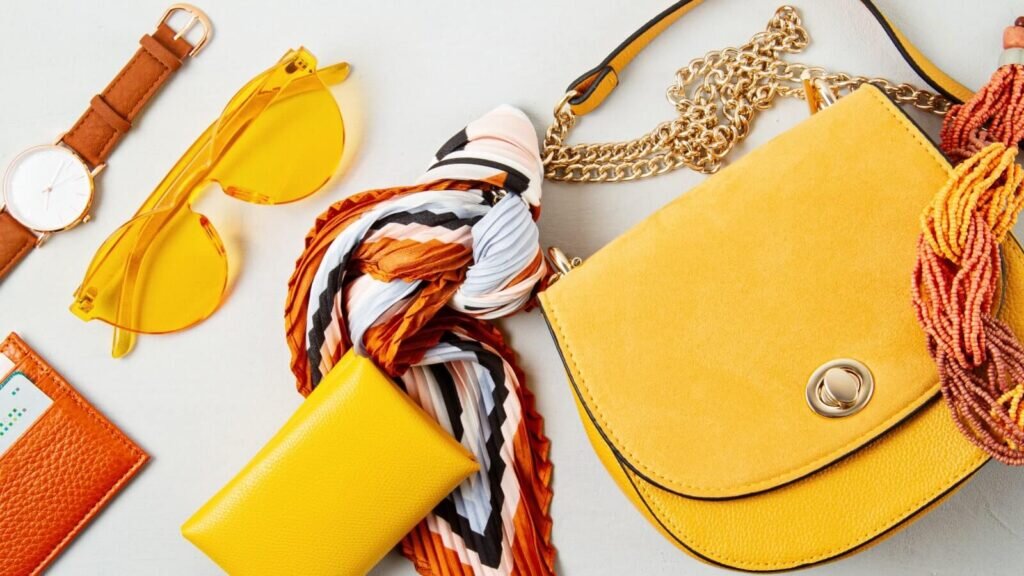 A set of various bright yellow and orange accessories.