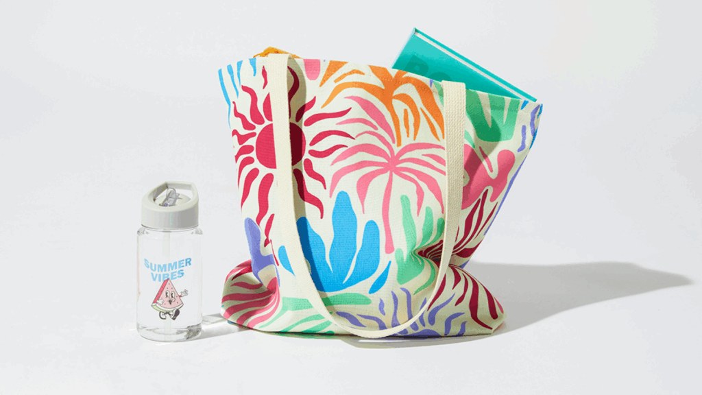 A colorful bag containing a bottle and a water bottle, showcasing vibrant patterns and practical design.