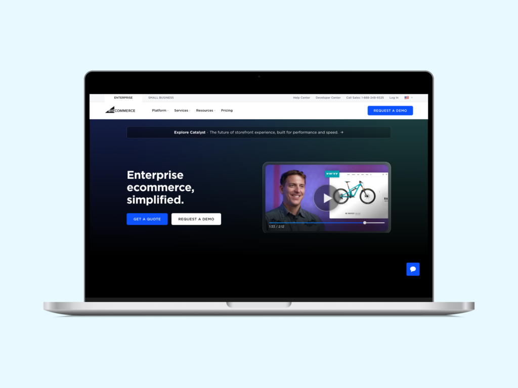 A mockup of a laptop with BigCommerce’s homepage on the screen.