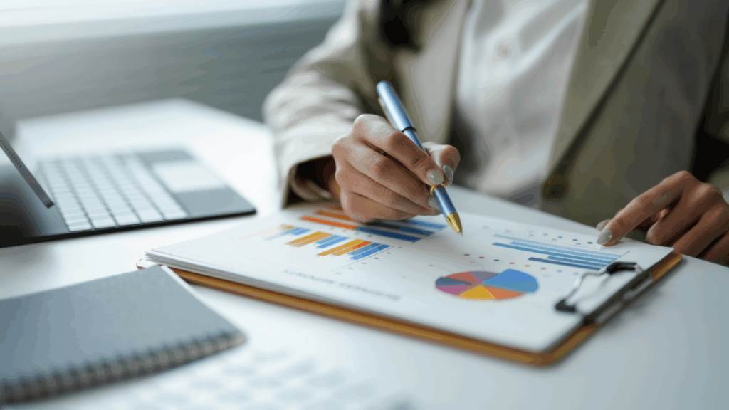 A woman analyzing graphs.