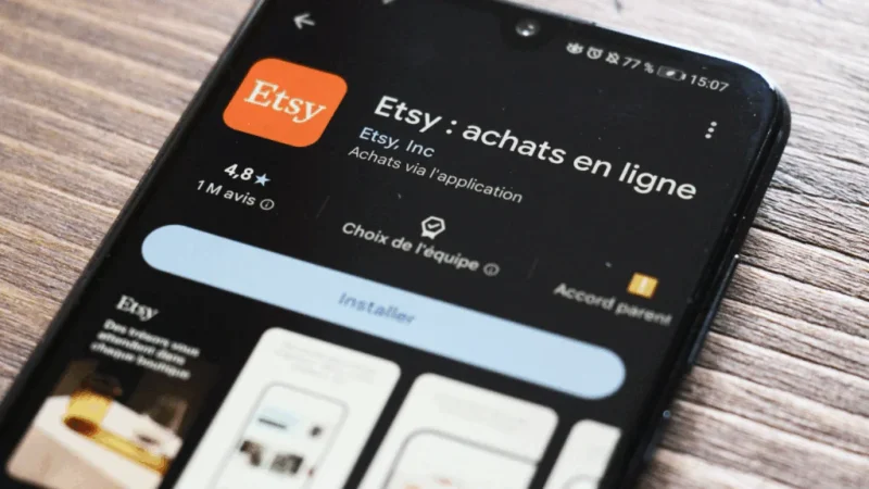 Mobile phone with Etsy application on the screen.