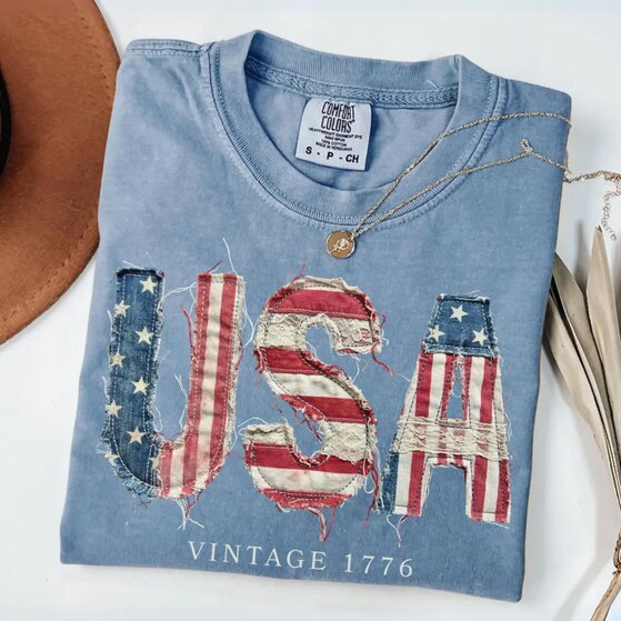 White vintage 4th of July-themed t-shirt with stars.