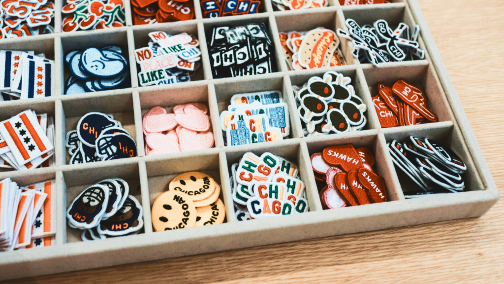 A box full of different patches.