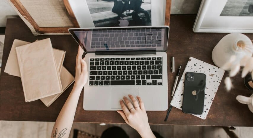A man using a laptop.