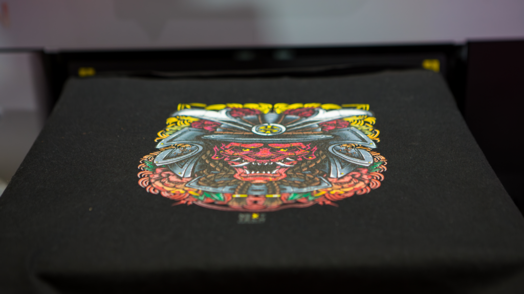A colorful Japanese-styled design is being printed using direct-to-film (DTF) printing.
