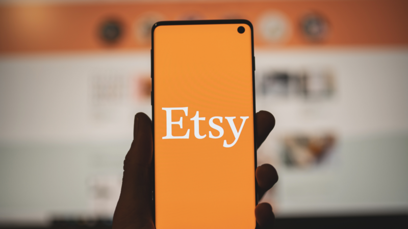 An inviting scene of an Etsy seller's setup featuring colorful handmade goods, emphasizing the journey to financial success.