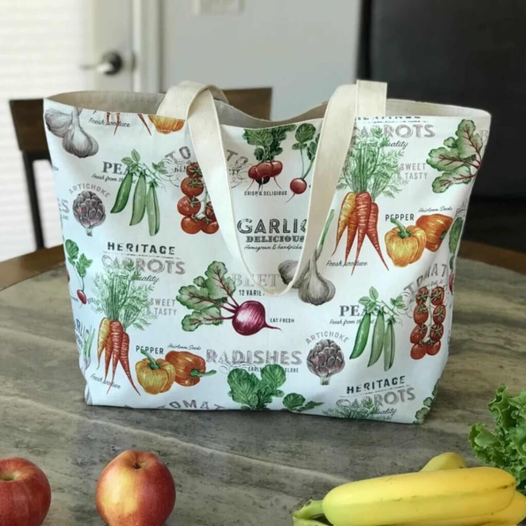 A grocery tote with images and names of various vegetables.