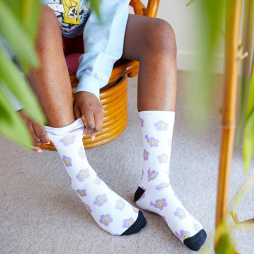 Custom socks in blue with a cat print.