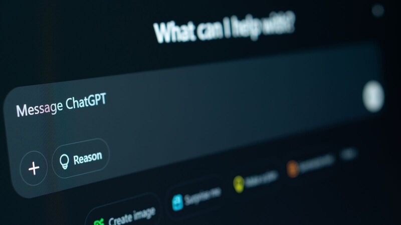 Close-up of a computer screen displaying the ChatGPT interface with the text "Message ChatGPT" and a search bar.