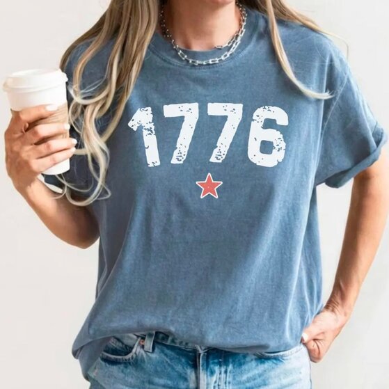 A blue “Stars and Stripes” 4th of July-themed t-shirt.