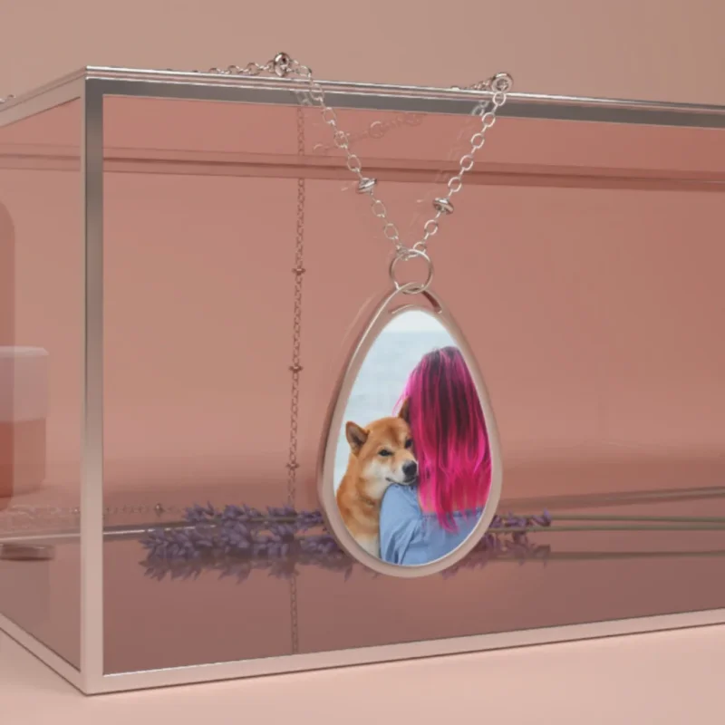 A custom necklace with a print of a dog and its owner.