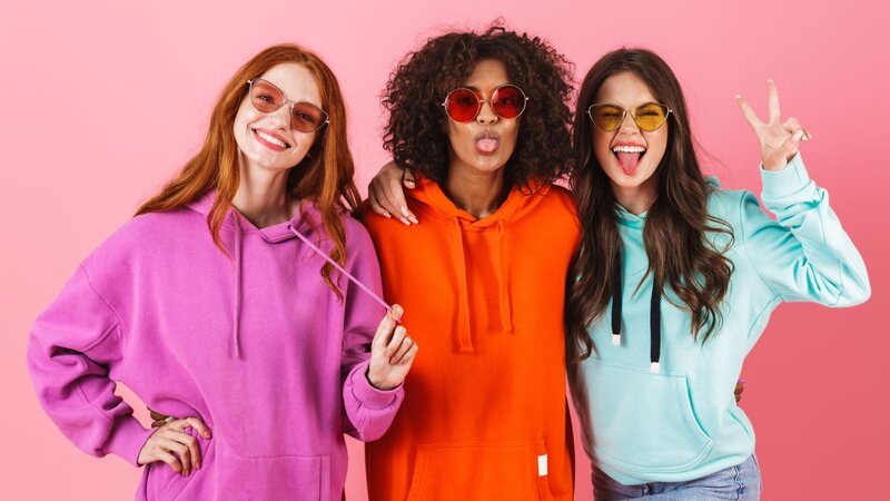 A group of women in hoodies