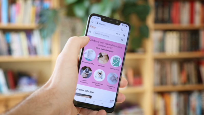 A smartphone with an Etsy application on it.