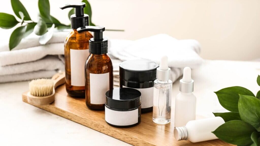A set of beauty products in various tubs and bottles.