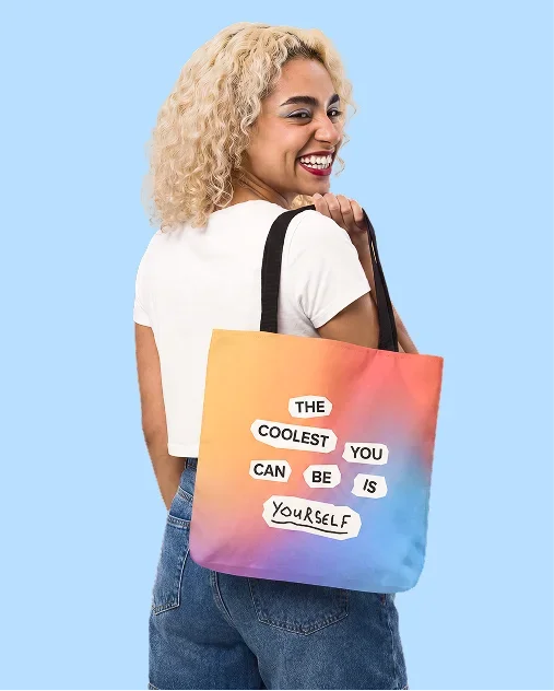 A motivational graphic featuring the phrase "the coolest you can be is yourself" in stylish typography against a vibrant background.