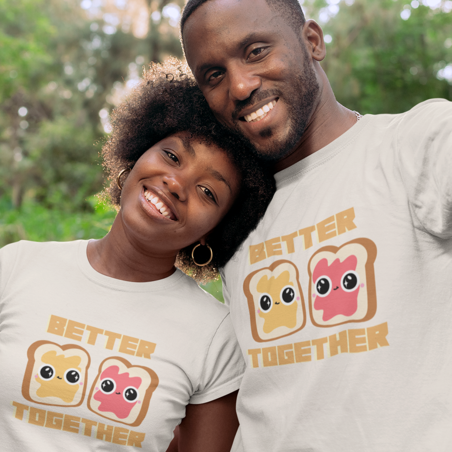 A smiling couple wearing matching "Better Together" shirts with cute cartoon toast designs.